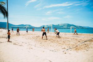 Playing volleyball at the beach
